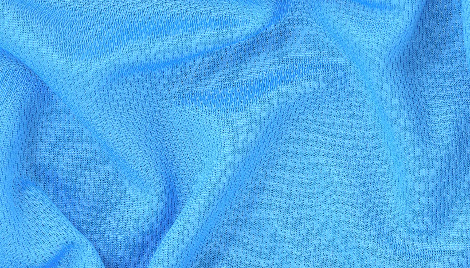 Blue polyester fabric texture background, sports wear background