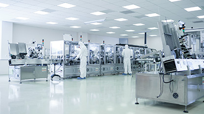 An expansive room featuring numerous machines, highlighting a dynamic and busy technological environment.